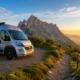Camper aparcada junto al inicio de una de las mejores rutas de senderismo en Cantabria, con los Picos de Europa al amanecer.